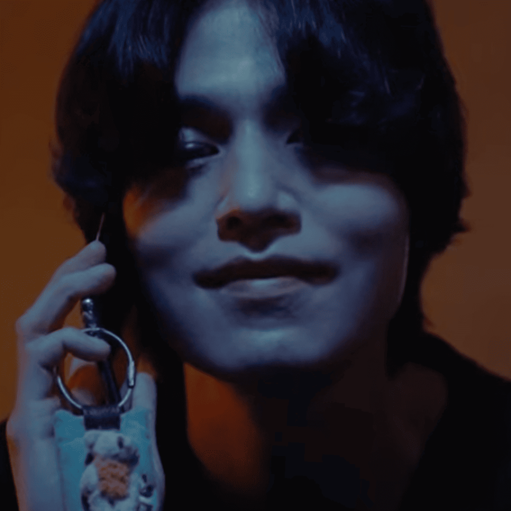 Mind-Bending Plot Twists - A person holding a cell phone up to their ear