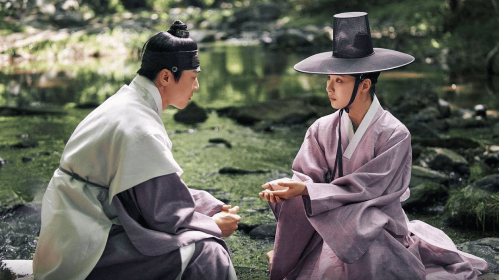 Best Korean Drama of 2024 - Captivating the King - two people in traditional clothing sitting next to each other