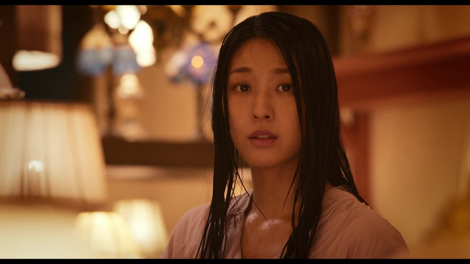 Light Shop K-Drama: A person with long black hair standing in a room