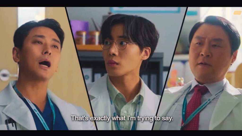 Trauma Code: Three individuals in white lab coats talking to each other