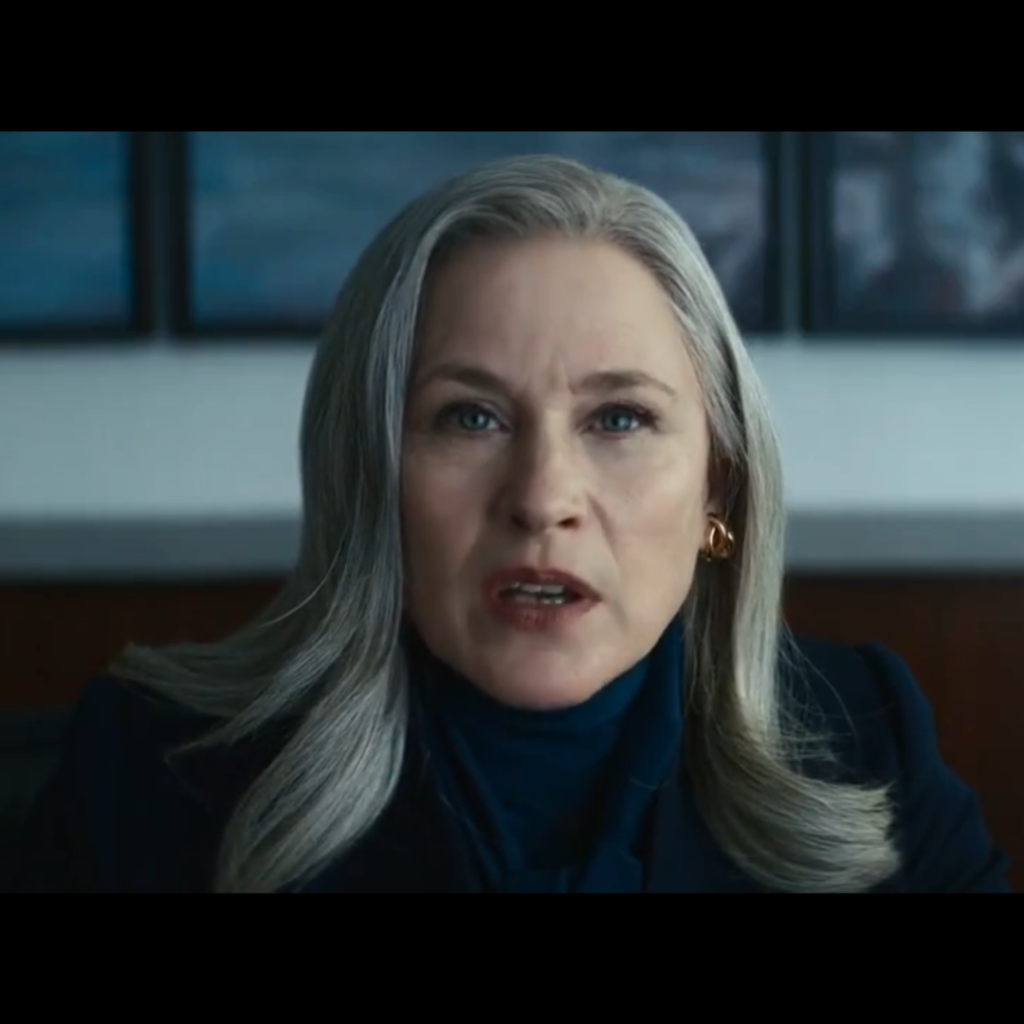 Severance Season 1 Ending Explained: a person with gray hair in an office