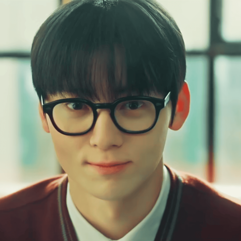 Study Group K-Drama Review: A person wearing glasses and a red sweater.