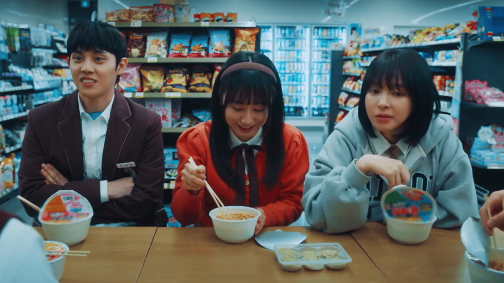 Study Group K-Drama Review: a group of people sitting at a table eating food