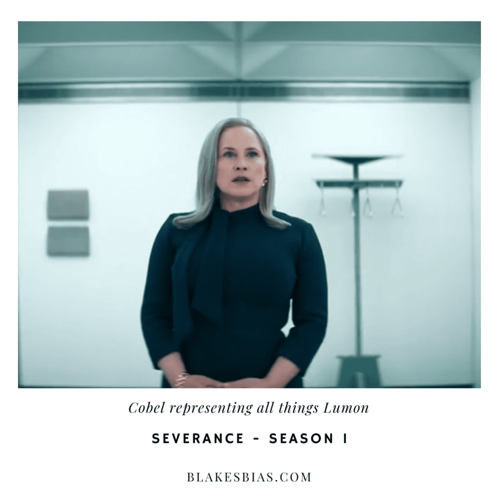Best Severance Characters: A person in a black dress standing in an empty room.