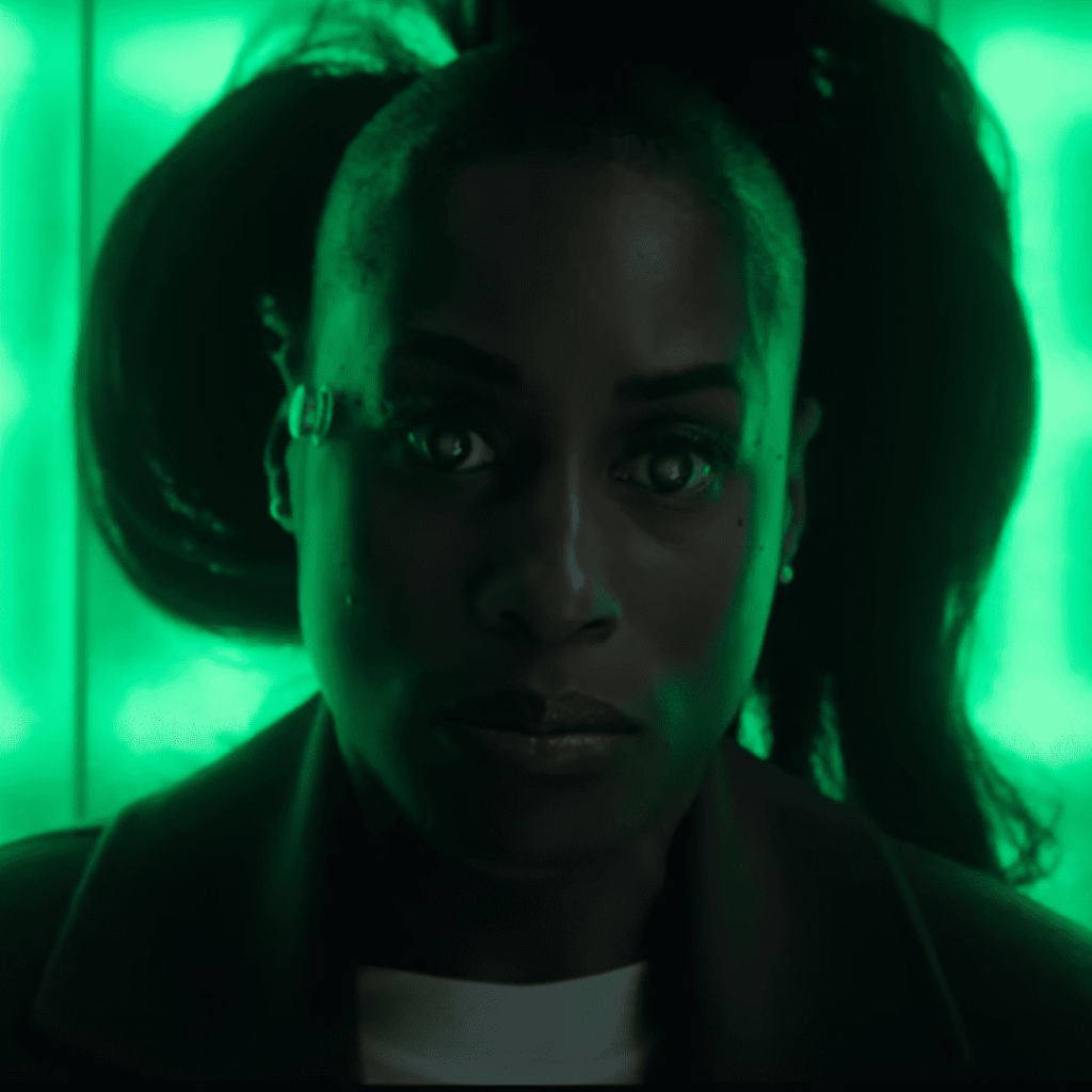 Black Mirror Season 7 Reflection: Brandy lying on the table, immersed in the VR device in Hotel Reverie, symbolizing her deep dive into a virtual world where reality and illusion collide