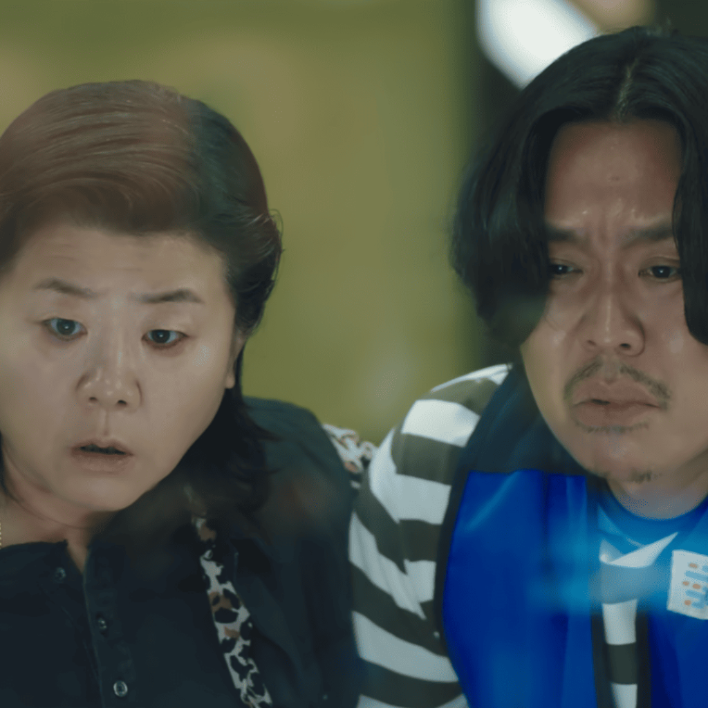 Heavenly Ever After Review" Young Ae and a debtor watching lottery results