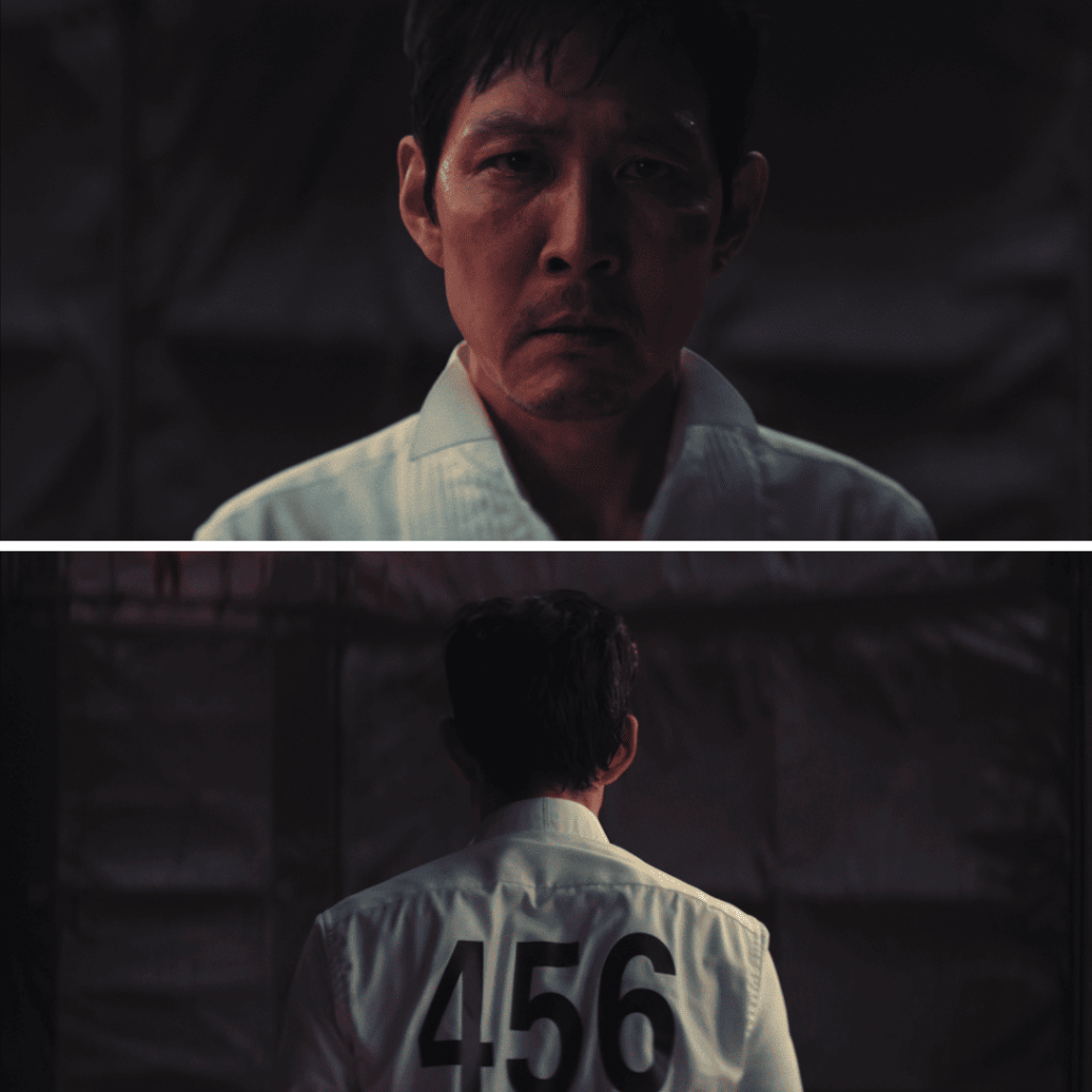 Main Squid Game 3 player in white shirt with number 456 looks grim