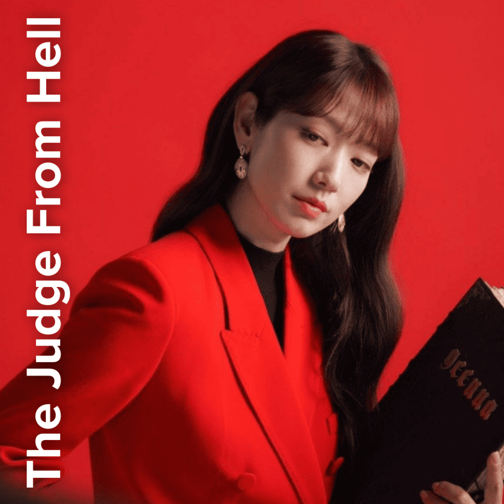 Park Shin-hye in red holding a black book in The Judge From Hell — a new K-drama like Squid Game with sinister survival twists.