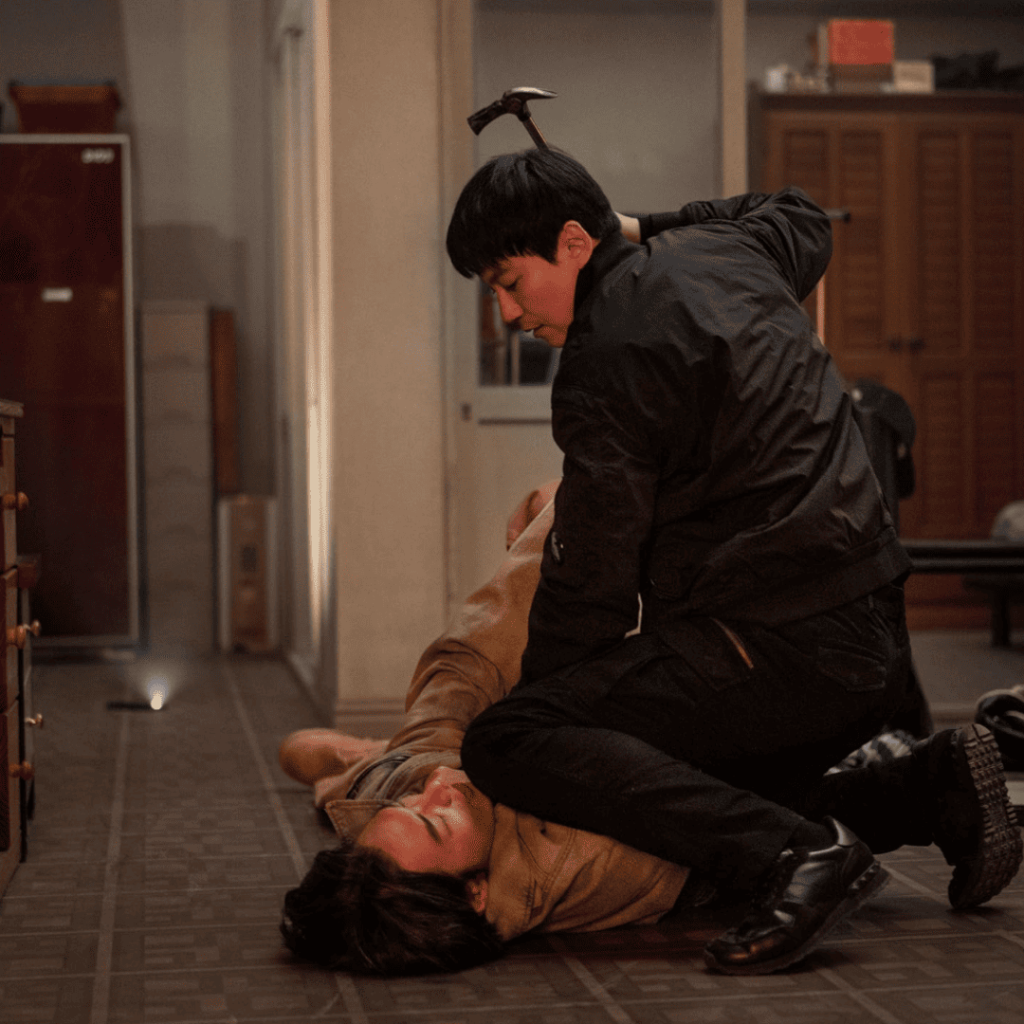 Officer Lee Do pinning Moon Baek down with a hammer in Trigger K-drama Episodes 1-5 Review.