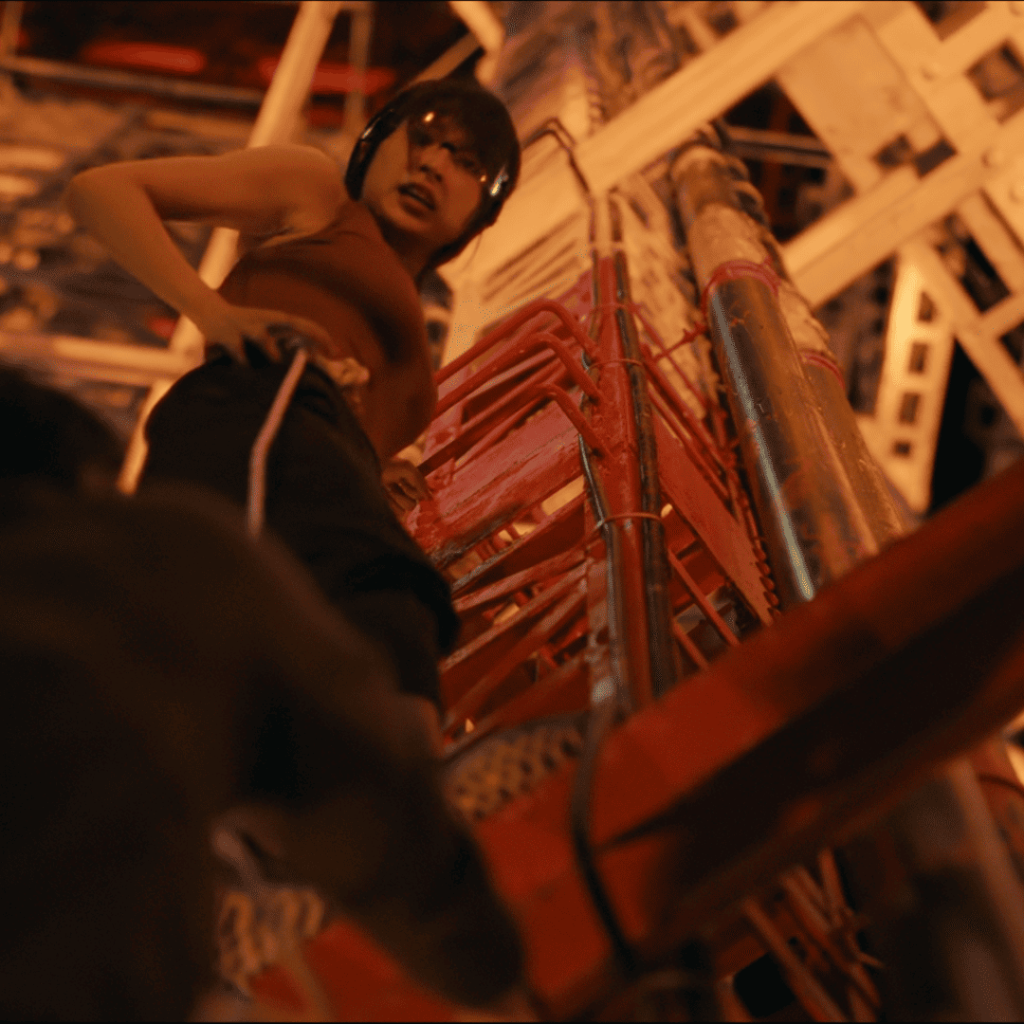 Usagi looks down on Ryuji as they climb Tokyo Tower in Alice in Borderland Season 3 Review