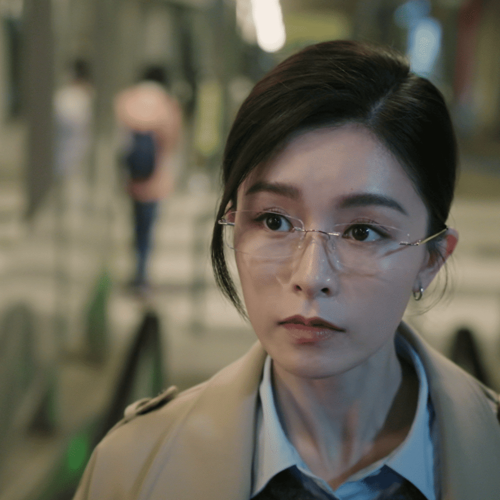 Mobius Mid-Season Review close-up still of An Lan, reflecting doubt and quiet desperation as timelines blur