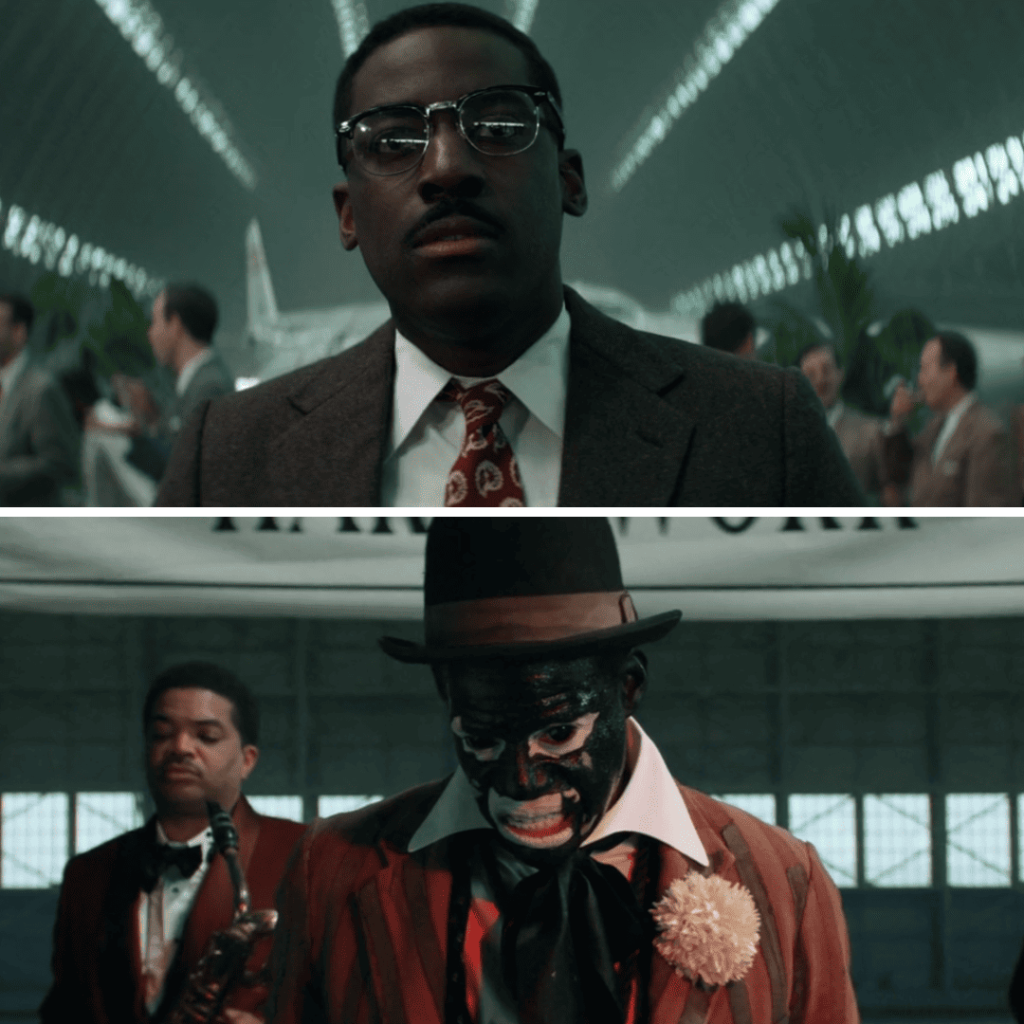 THEM (2021): Henry Emory at a work function, staring in disbelief at a performer in blackface.