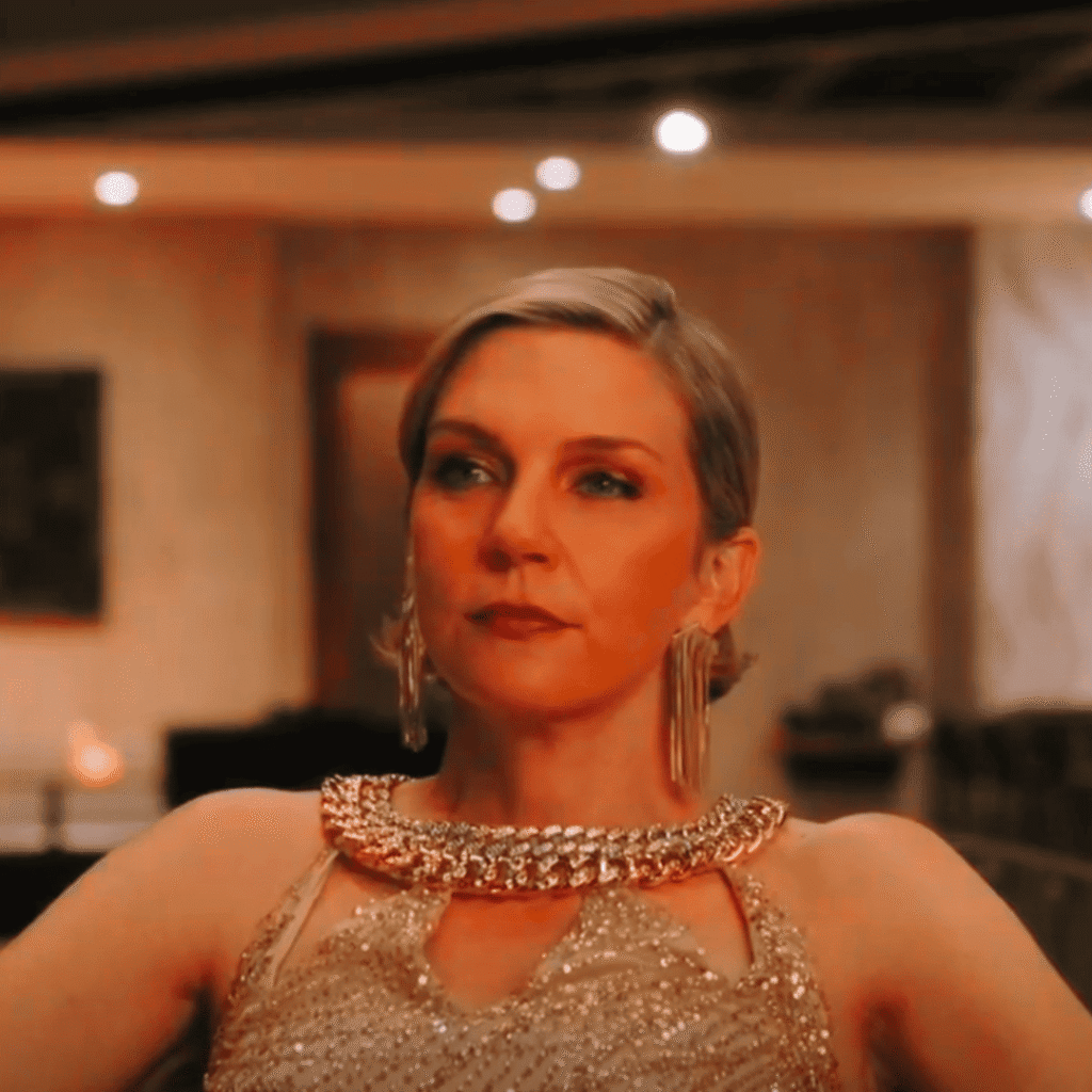 Pluribus Explained: Carol dresses up to celebrate her anniversary while living inside a world that no longer belongs to her.