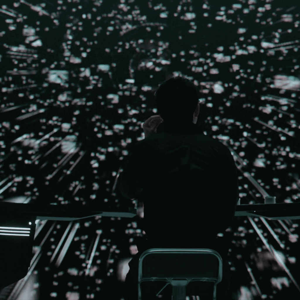 The Manipulated Review: An Yo-han standing before his AI surveillance screen