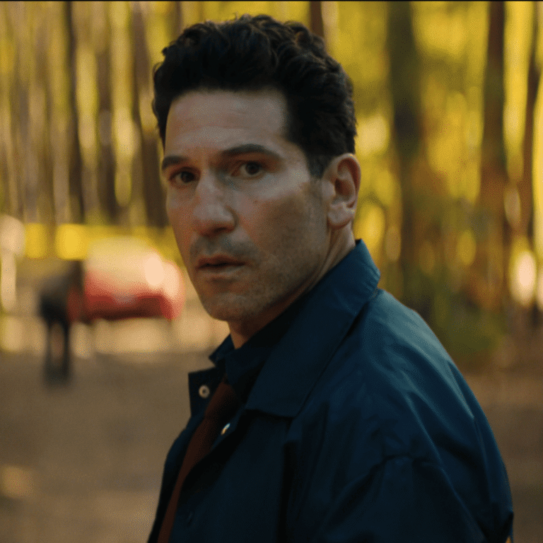 Jack Harper investigating the crime scene in the woods, highlighting the conflict of interest discussed in our His & Hers Netflix recap explained.