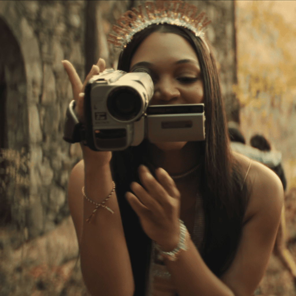 Young Anna in the woods holding a camcorder on her 16th birthday; the foundational moment of trauma explored in this His & Hers Netflix recap explained.