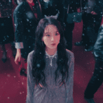 Sarah Kim in her iconic launch dress for The Art of Sarah Review, symbolizing the performance of class.