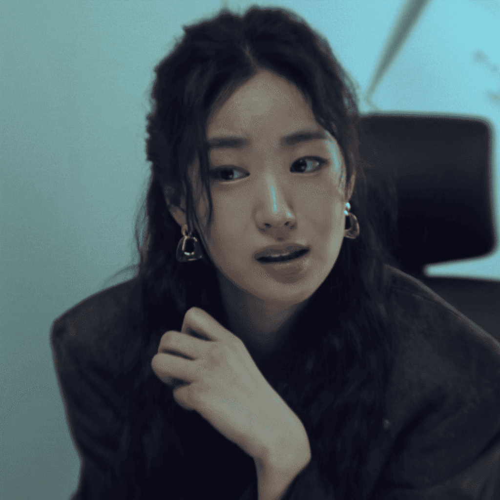 Close-up of Mi-jeong impersonating Sarah Kim at Sewol Department Store, a key conflict in The Art of Sarah Character Analysis.