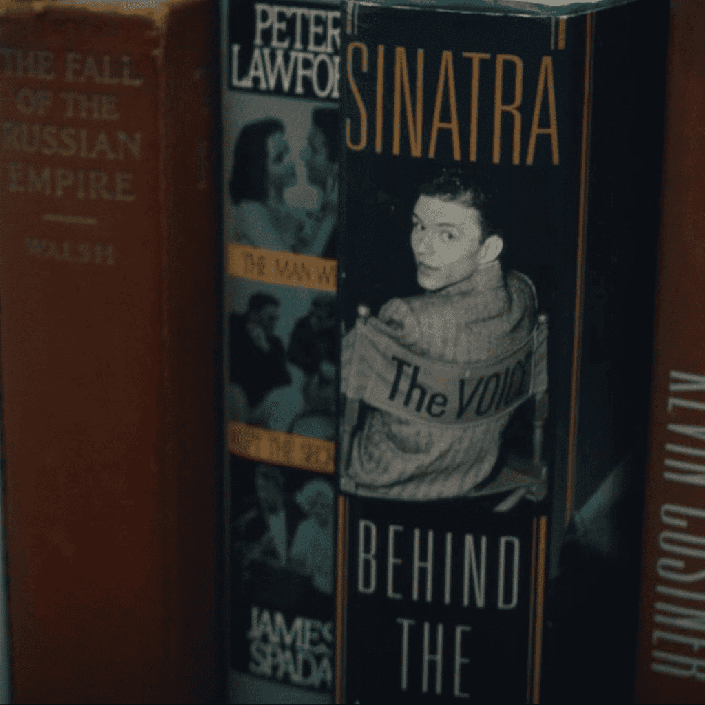 Paradise Season 2 Mid-Season Review Episodes 1-4: bookshelf featuring a book titled Sinatra among other volumes inside the bunker.