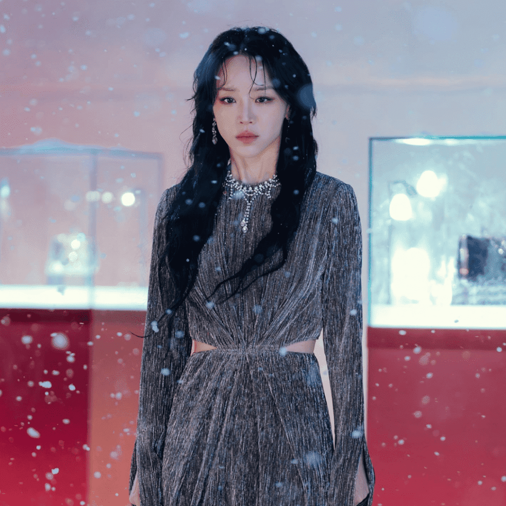 The final iconic still of Sarah Kim in her silver-grey dress for The Art of Sarah Character Analysis.