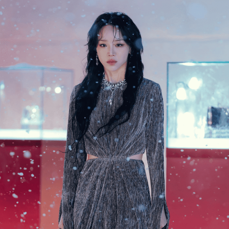 The final iconic still of Sarah Kim in her silver-grey dress for The Art of Sarah Character Analysis.