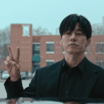 Na Hwa-jin flashing a friendly peace sign in a lighter scene from our Teach You a Lesson review.