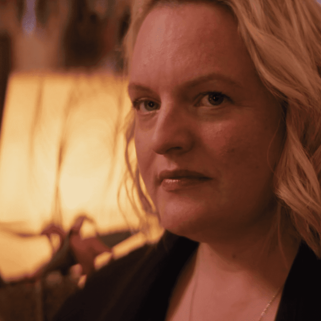 A close-up still image for The Testaments Review showing June Osborne inside the home of Daisy’s adoptive parents in Toronto.